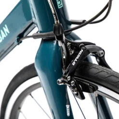 Vélo Route Femme Regular Triban - Vert 17 Vélo Route Femme Regular Triban - Vert -Vélorbain Magasin velo route femme regular triban vert 5