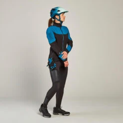 Rockrider VESTE HIVER VTT FEMME TURQUOISE NOIR 13 Rockrider VESTE HIVER VTT FEMME TURQUOISE NOIR -Vélorbain Magasin veste hiver vtt femme turquoise noir 1
